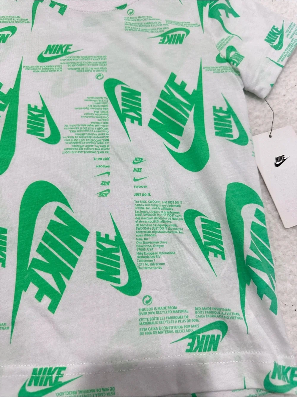 Boy’s Nike White Tee with Bright Green Allover Logo Print